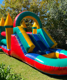 image of jumping castle water slide inflatable for hire